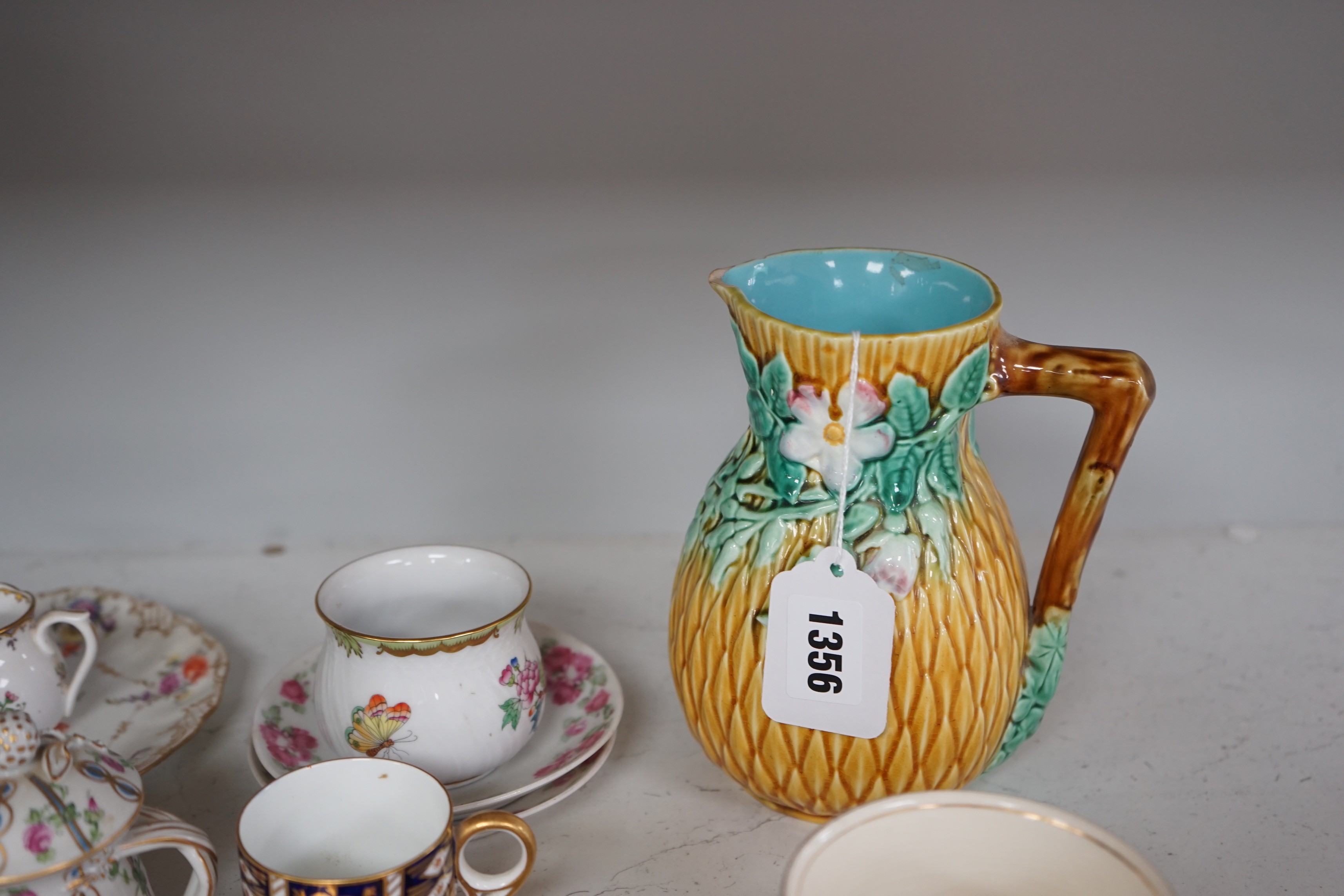 A group of continental porcelain, to include Meissen, Dresden etc. cups, trinkets, jugs, and saucers, tallest 16.5cm